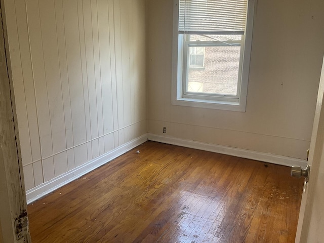 6832 S S Shore Dr Unit 1, Chicago, IL 60649 - spare room with hardwood / wood-style floors and baseboards