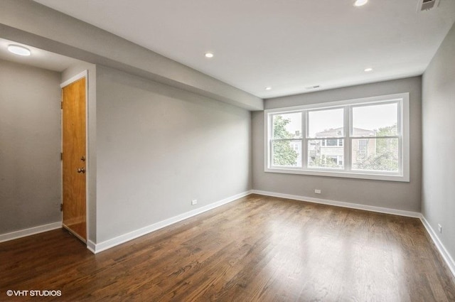 2553 W Summerdale St Unit 2E, Chicago, IL 60625 - empty room with wood finished floors, baseboards, and recessed lighting