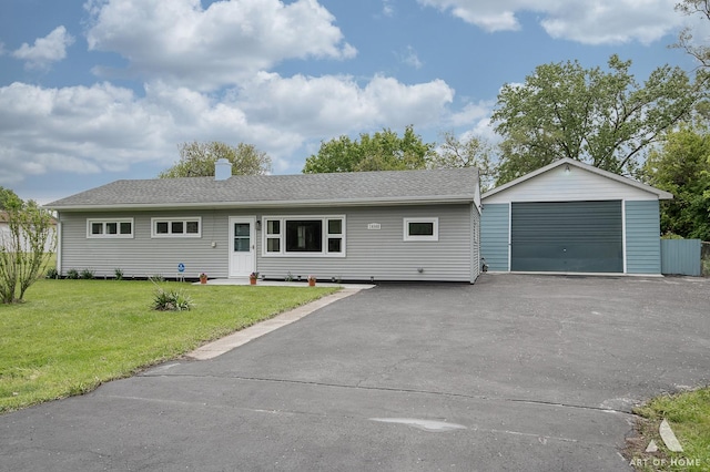 16568 Plainview Dr, Markham, IL 60428 - ranch-style house with a detached garage, a front lawn, an outdoor structure, asphalt driveway, and a chimney