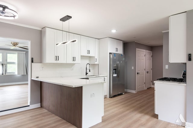 16568 Plainview Dr, Markham, IL 60428 - kitchen with stainless steel fridge, a peninsula, a sink, baseboards, and crown molding