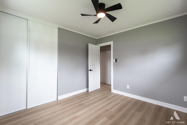 16568 Plainview Dr, Markham, IL 60428 - unfurnished bedroom with wood finished floors, a closet, baseboards, ornamental molding, and ceiling fan