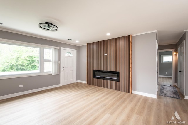 16568 Plainview Dr, Markham, IL 60428 - unfurnished living room with crown molding, a glass covered fireplace, wood finished floors, baseboards, and recessed lighting