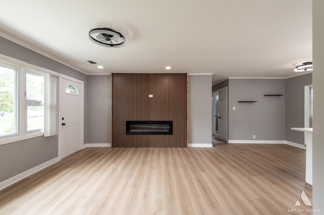 16568 Plainview Dr, Markham, IL 60428 - unfurnished living room with ornamental molding, wood finished floors, a glass covered fireplace, baseboards, and recessed lighting