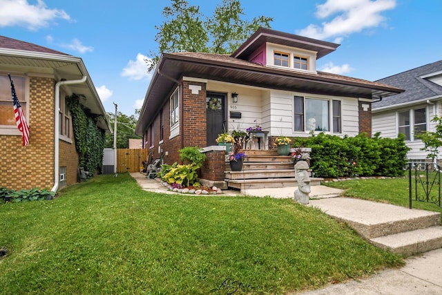 905 Kelly Ave, Joliet, IL 60435 - bungalow-style home featuring brick siding