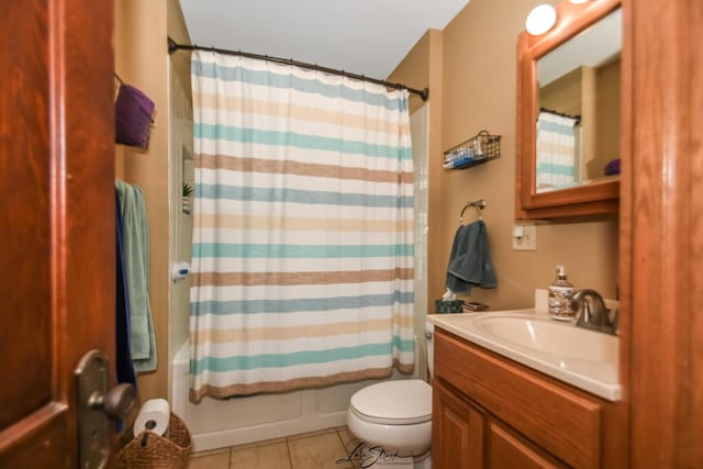 905 Kelly Ave, Joliet, IL 60435 - bathroom featuring tile patterned floors, vanity, toilet, and shower / bathtub combination with curtain