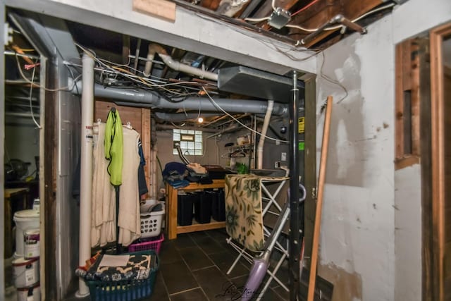 905 Kelly Ave, Joliet, IL 60435 - basement featuring dark tile patterned floors