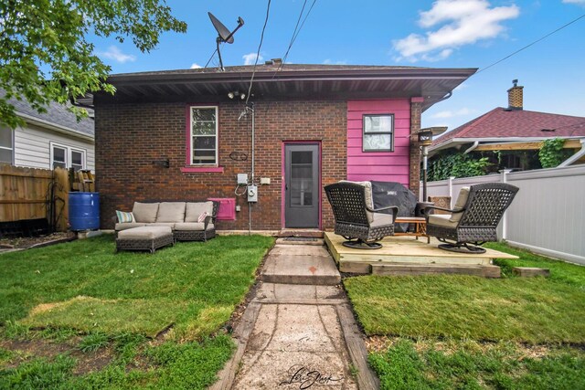 905 Kelly Ave, Joliet, IL 60435 - back of house with an outdoor living space and brick siding