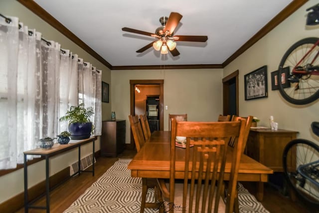 905 Kelly Ave, Joliet, IL 60435 - dining area with a ceiling fan, wood finished floors, and crown molding