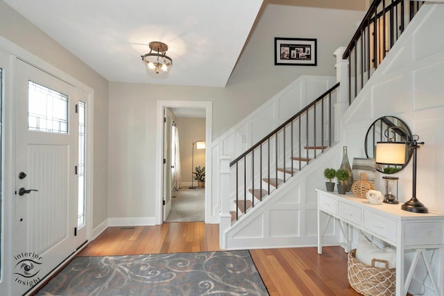 883 White Tail Bnd, Manteno, IL 60950 - entrance foyer with wood finished floors, stairway, baseboards, and a chandelier