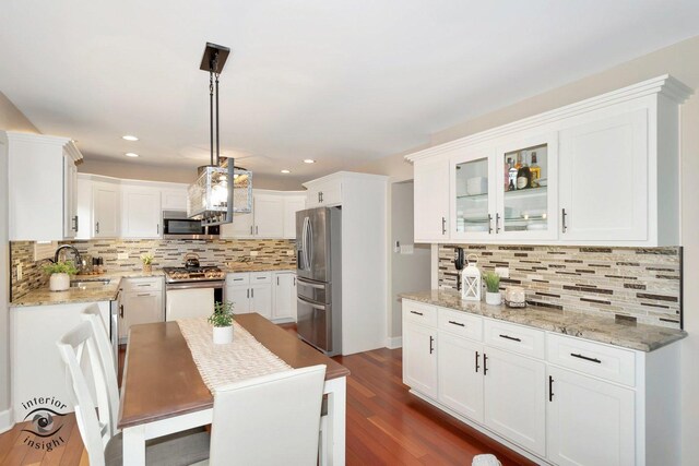883 White Tail Bnd, Manteno, IL 60950 - kitchen featuring stainless steel appliances, backsplash, a sink, white cabinets, and recessed lighting