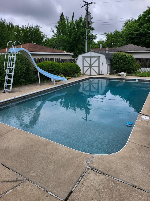 3034 190th St, Lansing, IL 60438 - swimming pool with a water slide and a diving board