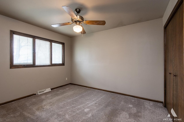 3034 190th St, Lansing, IL 60438 - empty room with light colored carpet, baseboards, and a ceiling fan