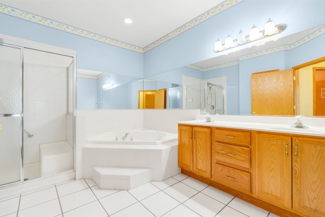 11104 Karen Dr, Orland Park, IL 60467 - bathroom featuring a stall shower, a garden tub, double vanity, and tile patterned flooring