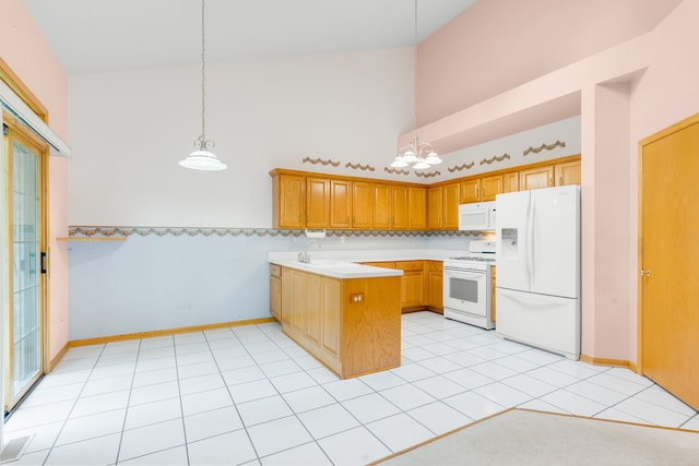 11104 Karen Dr, Orland Park, IL 60467 - kitchen featuring white appliances, a peninsula, high vaulted ceiling, light countertops, and a sink