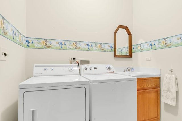 11104 Karen Dr, Orland Park, IL 60467 - laundry area with washer and clothes dryer and cabinet space
