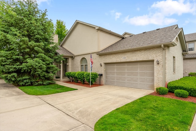 11104 Karen Dr, Orland Park, IL 60467 - view of front facade featuring brick siding, concrete driveway, a garage, a shingled roof, and a front lawn