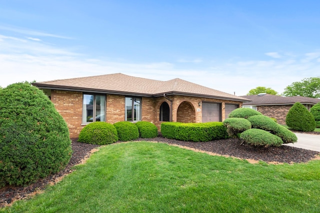 7618 W 157th St, Orland Park, IL 60462 - ranch-style house with a garage, brick siding, a front yard, and a shingled roof
