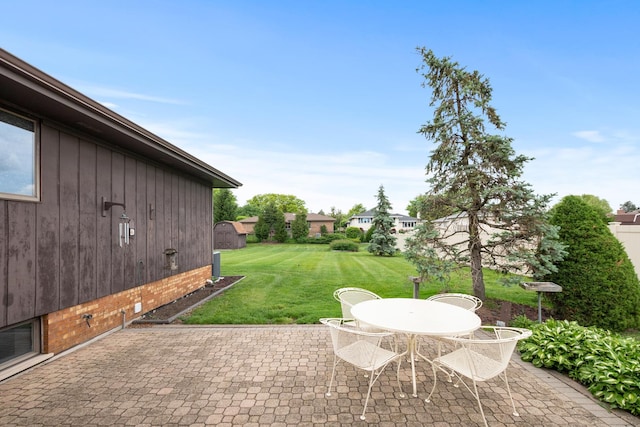 7618 W 157th St, Orland Park, IL 60462 - view of green lawn featuring a patio and outdoor dining space