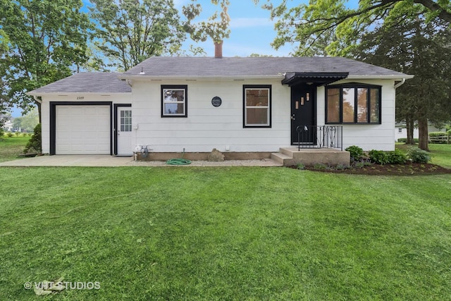 2309 N Riverside Dr, Mchenry, IL 60051 - ranch-style home featuring a front lawn, a garage, and a shingled roof