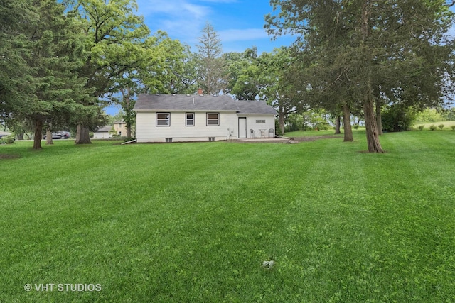 2309 N Riverside Dr, Mchenry, IL 60051 - back of house with a lawn