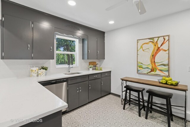 2309 N Riverside Dr, Mchenry, IL 60051 - kitchen with dishwasher, light countertops, a ceiling fan, recessed lighting, and baseboard heating