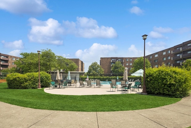720 Wellington Ave Unit 206, Elk Grove Village, IL 60007 - view of community with a swimming pool and a patio