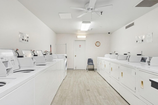 720 Wellington Ave Unit 206, Elk Grove Village, IL 60007 - shared laundry featuring washing machine and dryer, a ceiling fan, and light wood-type flooring