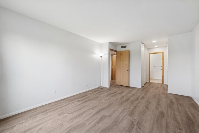 720 Wellington Ave Unit 206, Elk Grove Village, IL 60007 - empty room featuring light wood-type flooring, baseboards, and recessed lighting