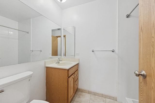 720 Wellington Ave Unit 206, Elk Grove Village, IL 60007 - bathroom featuring toilet, vanity, and a shower