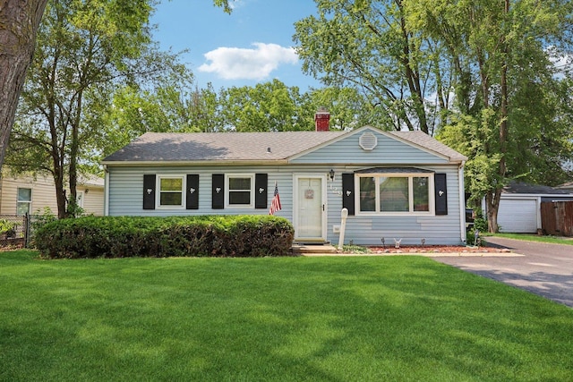 129 S Hammes Ave, Joliet, IL 60436 - ranch-style house featuring a chimney, entry steps, an outbuilding, and roof with shingles