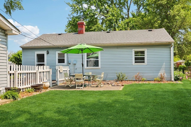 129 S Hammes Ave, Joliet, IL 60436 - rear view of property featuring a chimney and roof with shingles
