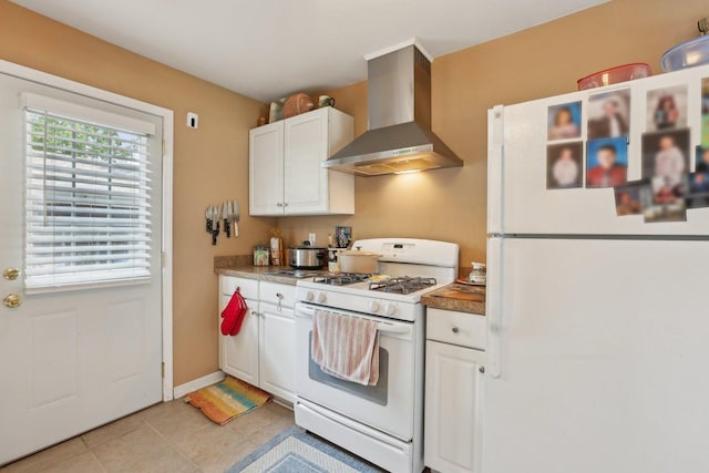 129 S Hammes Ave, Joliet, IL 60436 - kitchen with white appliances, wall chimney exhaust hood, white cabinetry, and light tile patterned flooring