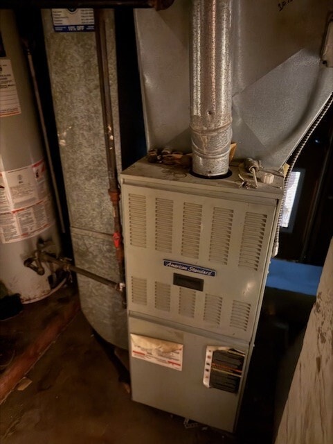 1723 N Monitor Ave, Chicago, IL 60639 - utility room with water heater