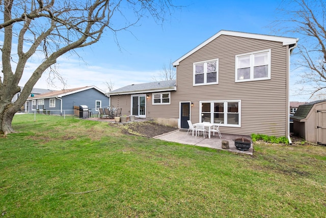 8048 W Magnolia Dr, Frankfort, IL 60423 - rear view of property with a fire pit and a patio