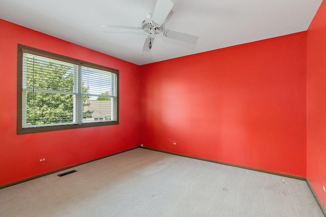 325 Indian Ridge Trl, Wauconda, IL 60084 - carpeted spare room with baseboards and ceiling fan