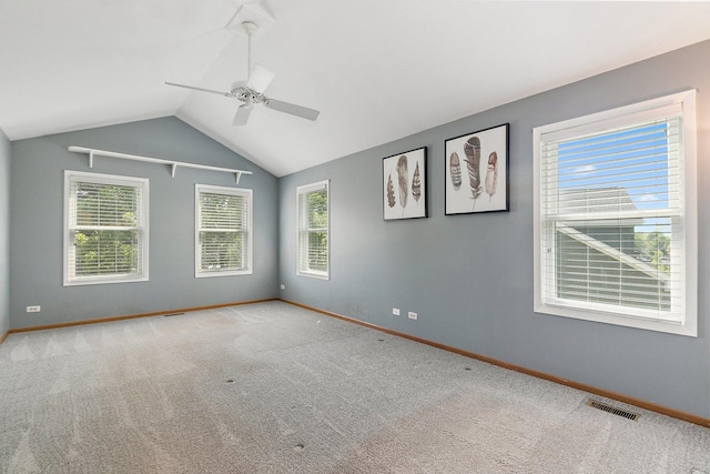 325 Indian Ridge Trl, Wauconda, IL 60084 - empty room featuring baseboards, ceiling fan, lofted ceiling, and carpet flooring