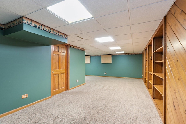 325 Indian Ridge Trl, Wauconda, IL 60084 - finished below grade area featuring carpet, baseboards, and a paneled ceiling