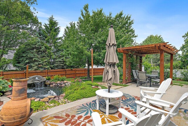 325 Indian Ridge Trl, Wauconda, IL 60084 - fenced backyard featuring a pergola, a patio area, and outdoor dining space