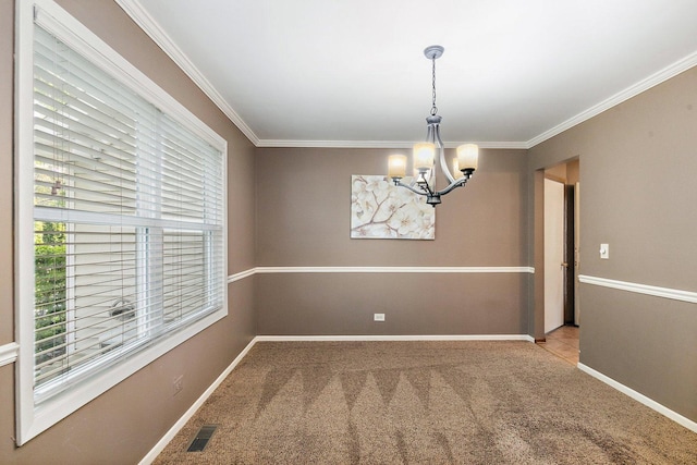 325 Indian Ridge Trl, Wauconda, IL 60084 - spare room featuring a chandelier, crown molding, carpet floors, and baseboards