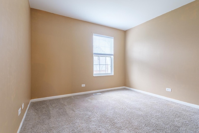 261 Springbrook Trl, Oswego, IL 60543 - carpeted empty room featuring baseboards