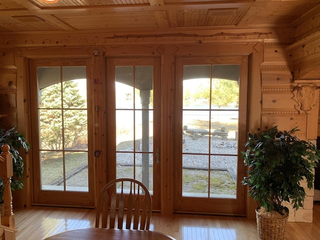 423 Mallard Pt, Danville, IL 61832 - doorway featuring wooden ceiling, light wood-style floors, and wooden walls