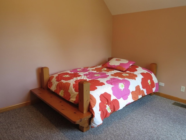 423 Mallard Pt, Danville, IL 61832 - bedroom featuring carpet, vaulted ceiling, and baseboards