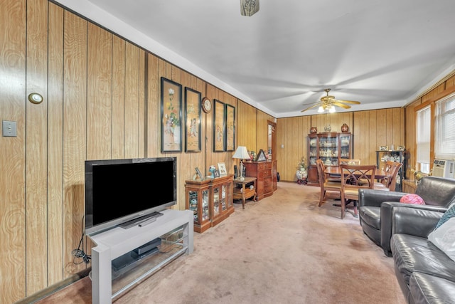 5434 W School St, Chicago, IL 60641 - living area featuring wooden walls, carpet, and a ceiling fan