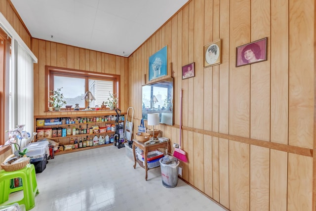 5434 W School St, Chicago, IL 60641 - sitting room featuring wooden walls and tile patterned floors