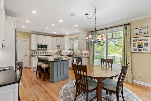 20142 N Deer Chase Ct, Deer Park, IL 60010 - dining space with ornamental molding, a chandelier, light wood-type flooring, recessed lighting, and baseboards