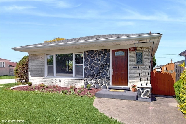 524 Escanaba Ave, Calumet City, IL 60409 - view of front facade with brick siding and stone siding