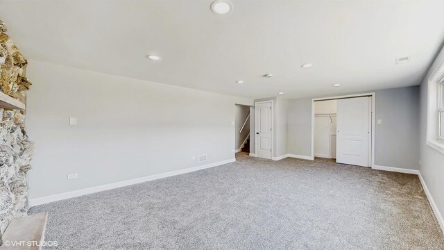 524 Escanaba Ave, Calumet City, IL 60409 - unfurnished bedroom featuring recessed lighting, carpet, a closet, and baseboards