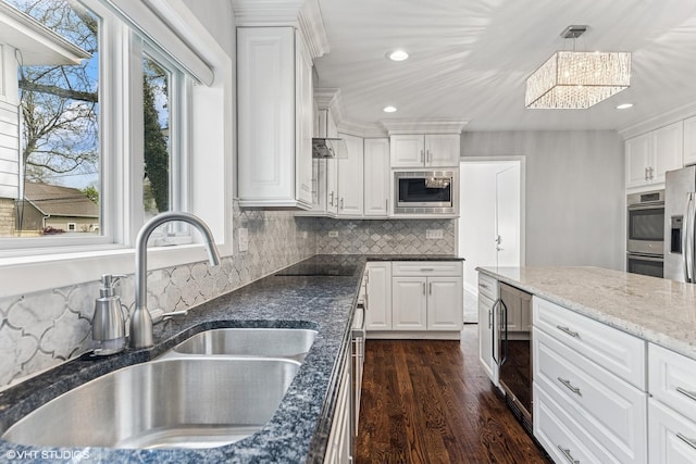 265 W Adams St, Elmhurst, IL 60126 - kitchen featuring a sink, appliances with stainless steel finishes, a chandelier, recessed lighting, and dark wood-style flooring