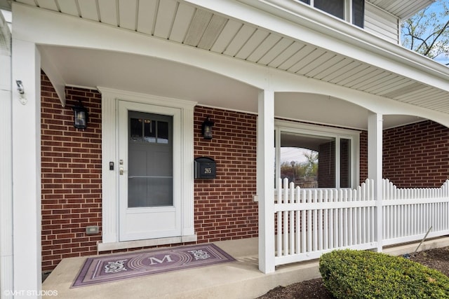 265 W Adams St, Elmhurst, IL 60126 - entrance to property featuring brick siding and a porch