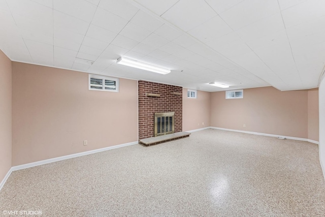265 W Adams St, Elmhurst, IL 60126 - below grade area featuring a fireplace and baseboards
